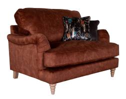 Buoyant Beatrix Snuggler Love Chair shown in Sublime Rust fabric 