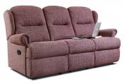 Manual sofa pictured in Ravello Plum fabric