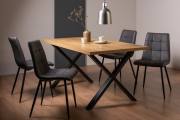 The Bentley Designs Ramsay Rustic Oak Effect Melamine 6 Seater Dining Table with X Leg & 4 Mondrian Dark Grey Faux Leather Chairs with Sand Black Powder Coated Legs 