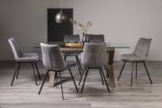 The Bentley Designs Turin Clear Tempered Glass 6 Seater Dining Table with Dark Oak Legs & 6 Fontana Grey Velvet Fabric Chairs with Grey Hand Brushing on Black Powder Legs Black Powder Coated Legs