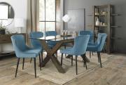 The Bentley Designs Turin Clear Tempered Glass 6 Seater Dining Table with Dark Oak Legs & 6 Cezanne Petrol Blue  Velvet Chairs with Sand Black Powder Coated Legs