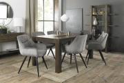 The Bentley Designs Turin Dark Oak 6-8 Seater Table & 6 Dali Grey Velvet Fabric Chairs with Sand Black Powder Coated Legs