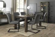 The Bentley Designs  Turin Dark Oak 6-8 Seater Table & 6 Lewis Distressed Dark Grey Fabric Cantilever Chairs with Sand Black Powder Coated Frame
