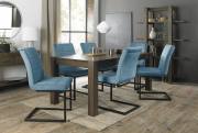 The Bentley Designs Turin Dark Oak 6-10 Seater Table & 6 Lewis Petrol Blue Velvet Fabric Cantilever Chairs with Sand Black Powder Coated Frame