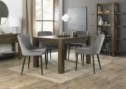 The Bentley Designs Turin Dark Oak 4-6 Seater Table & 4 Cezanne Grey Velvet Fabric Chairs with Sand Black Legs