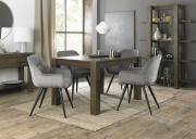 The Bentley Designs Turin Dark Oak 4-6 Seater Table & 4 Dali Grey Velvet Fabric Chairs with Sand Black Powder Coated Legs