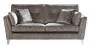 Pictured in the exclusive Evie fabric 0625 with large scatter cushions in 0095 and Chrome legs.