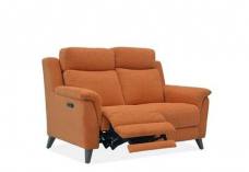 Sofa shown with one foot rest reclined 