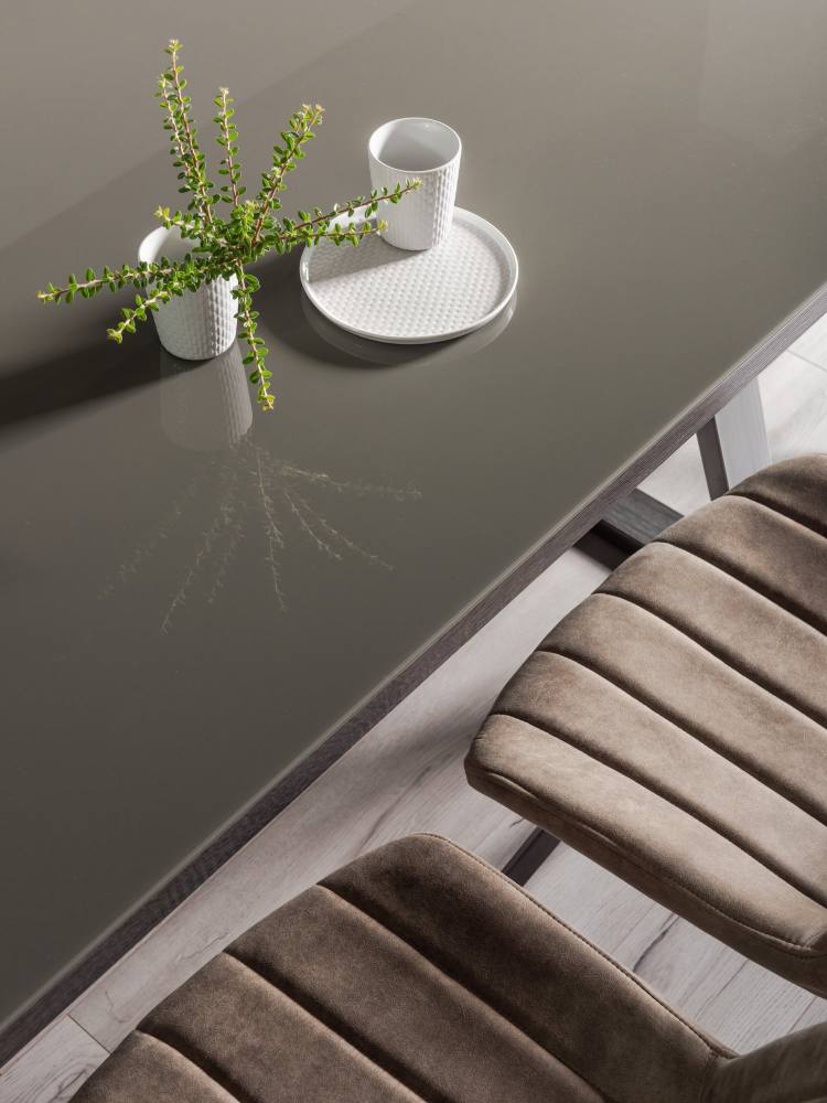 Close Up of the Bentley Designs Hirst Grey Painted Tempered Glass 6 Seater Table 