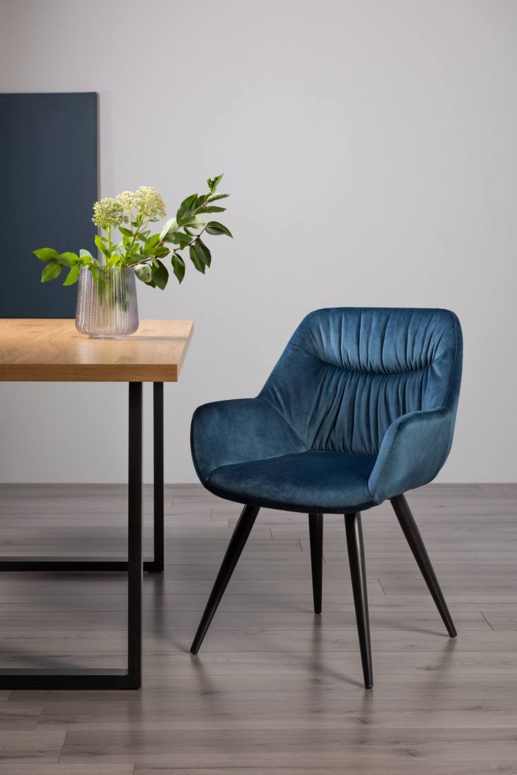 The Bentley Designs  Petrol Blue Velvet Chair on Display