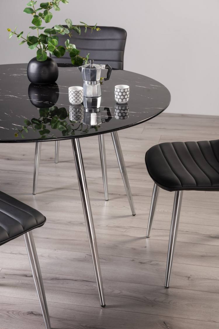 The Bentley Designs Christo Black Marble Effect Tempered Glass 4 Seater Dining Table with Shiny Nickel Plated Legs on Display 