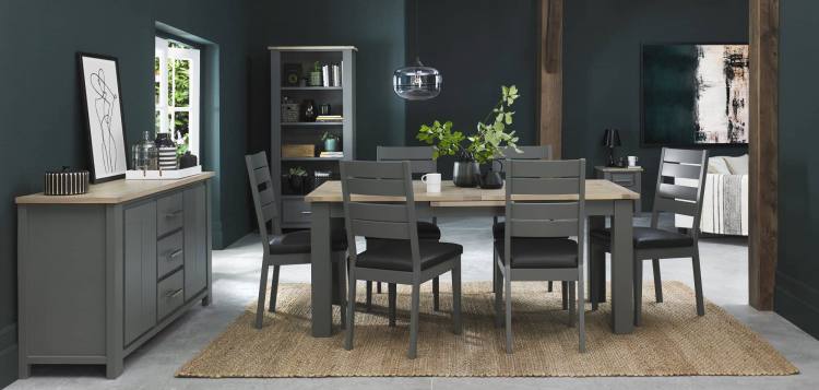 The Bentley Designs Oakham Dark Grey & Scandi Oak 6-8 Dining Table on Display with Oakham Dark Grey Chair with Dark Grey Faux Leather
