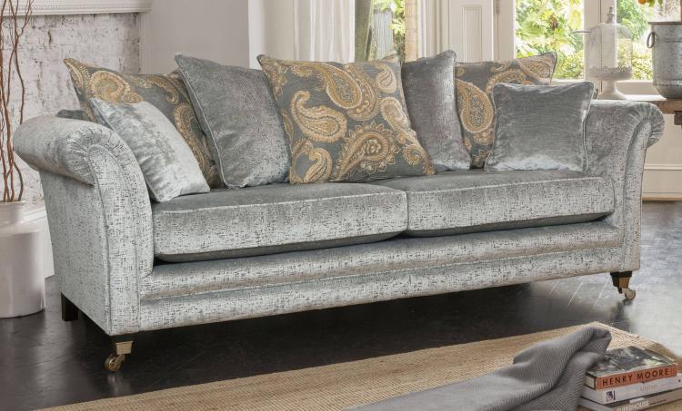Main fabric 9607, three pillows in 9333, two pillows in 9607, small scatter cushions in 9827, ebony bronze castor legs.