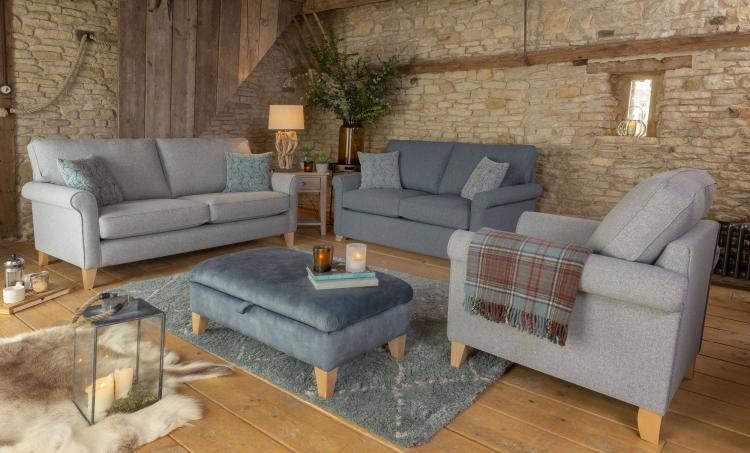 3 seater sofa in fabric 9477, small scatter cushions in 9082, light legs. Chair in fabric 9477, light legs.