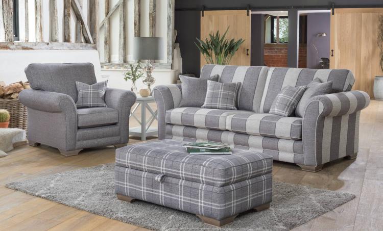 Grand sofa in fabric 8797, large scatters in 8507 and small scatters in 8627. Chair in 8507 with small scatter in 8627. Ottoman in 8627. All with Smokey Oak feet