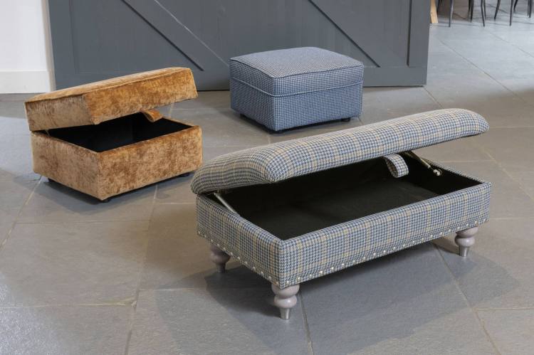 Storage stool in fabric 2743 (supplied on glides), Footstool in fabric 2557 (supplied on glides) and legged ottoman in fabric 2487, grey ash/brushed nickel legs (optional pewter studding). Storage stool and Footstool not available with studs.