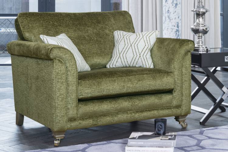 Snuggler in fabric 2690, small scatter cushions in 2148, smokey oak/satin nickel castor legs (FM3).