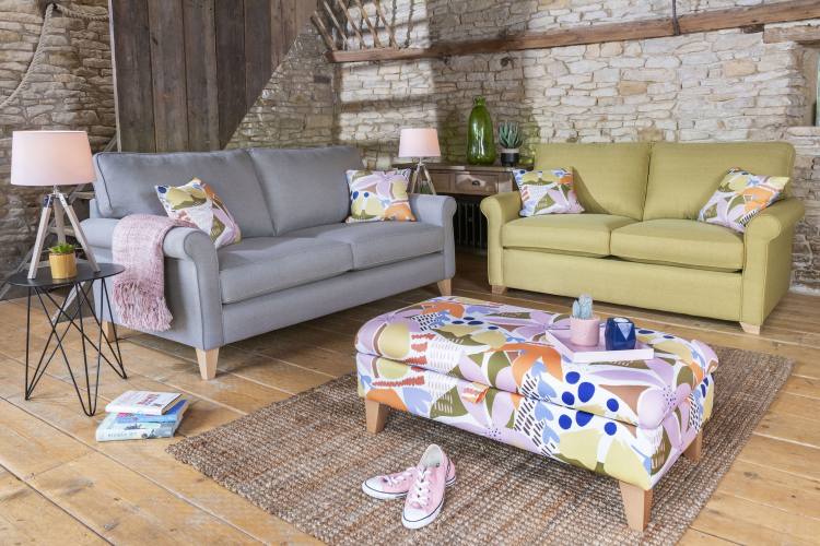 Poppy 3 seater sofa (high legs only) in fabric 1637, small scatter cushions in fabric 1349, light legs. Poppy 2 seater sofa bed (low feet only) in fabric 1630, small scatter cushions in 1349, light feet. Cosy Legged Ottoman in fabric 1349, light legs.