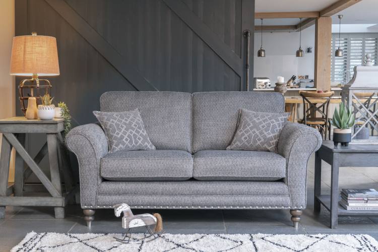 2 seater sofa (standard back) in fabric 2827, small scatter cushions in 2137, antique ash/brushed nickel legs. Item shown with optional pewter studding. 