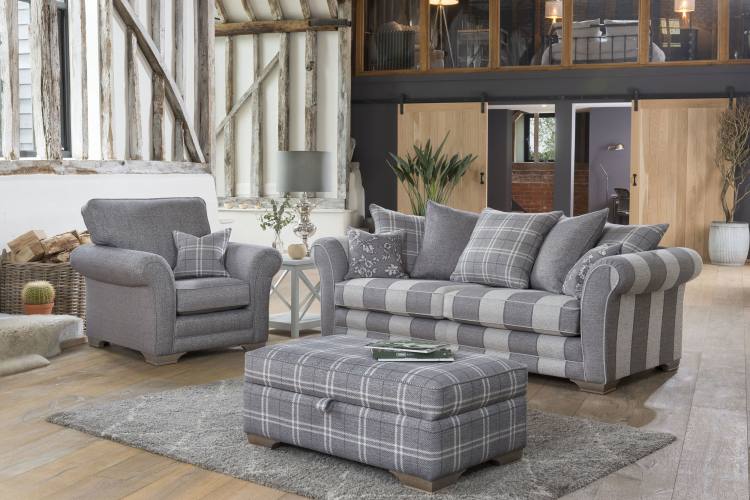 Franklin grand sofa in fabric 8797, 3 pillows in 8627, 2 pillows in 8507, small scatter cushions in 8867. Chair in fabric 8507, small scatter cushion in 8627. Ottoman in fabric 8627. All feet in smokey oak.