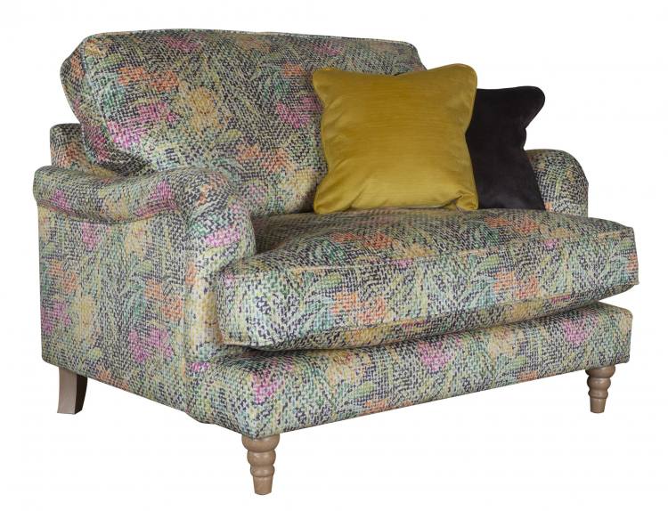 Pictured in Courture Multi, scatters cushions in Jedi Mustard and Sublime Asphalt with Limed Oak Turned legs