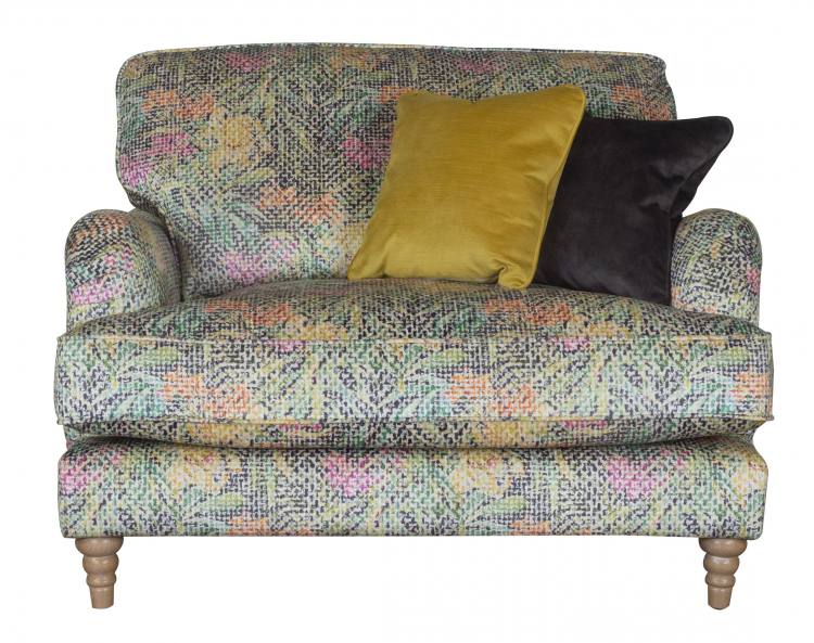 Pictured in Courture Multi (no longer available as a main fabric cover), scatters cushions in Jedi Mustard and Sublime Asphalt with Limed Oak Turned legs