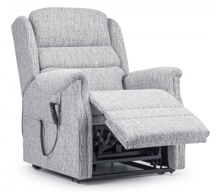 Chair shown with leg rest partially raised 