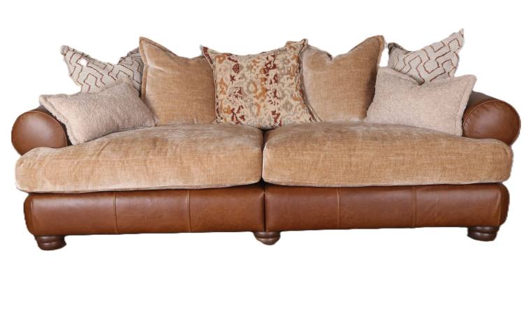 Pillow-back version shown in Lazio brown leather with Kairo Caramel, Burnaby Rust, Otis Rust & Larry latte bolster cushions 